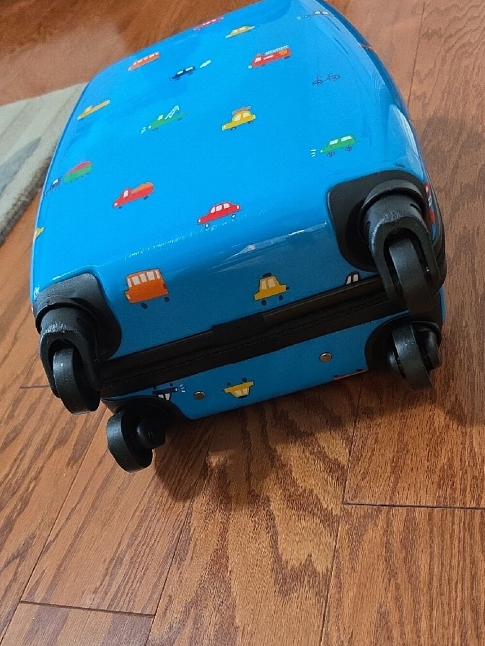 Marshalls Bright Blue Kids Rolling Suitcase with Colorful Car Print - Picture 5 of 14